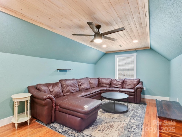 living room featuring wood finished floors, baseboards, ceiling fan, vaulted ceiling, and wooden ceiling