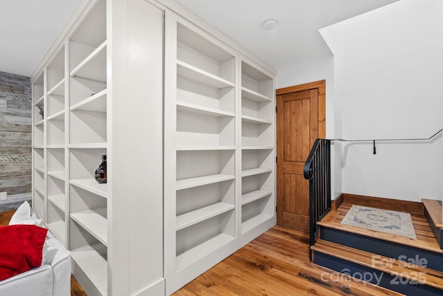 spacious closet with wood finished floors