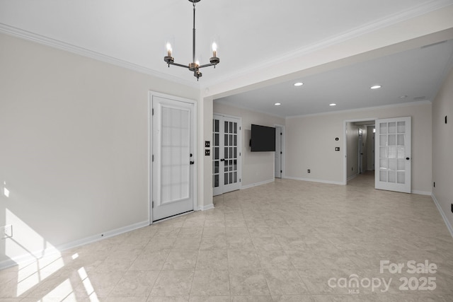 interior space featuring a chandelier, french doors, baseboards, and ornamental molding