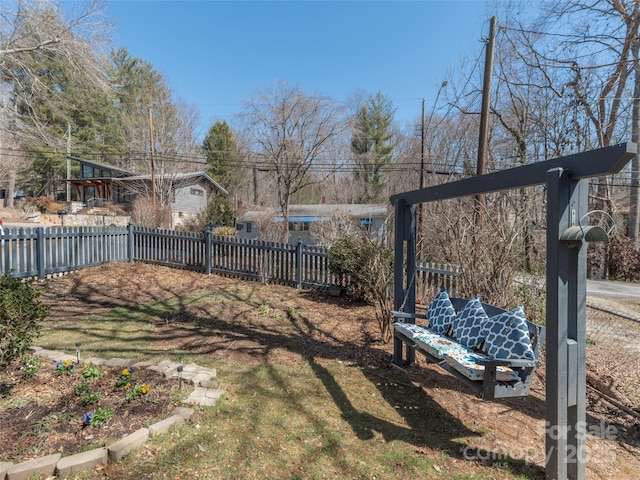 view of yard with fence