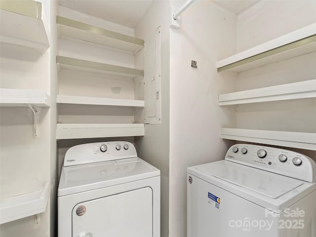 laundry area featuring laundry area and washing machine and dryer