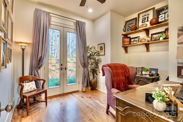 office space with light wood-style flooring, french doors, baseboards, and a ceiling fan