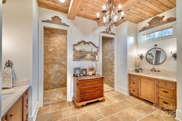 bathroom featuring vanity, brick wall, wood ceiling, walk in shower, and beamed ceiling