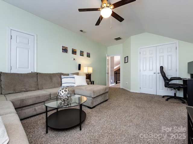 living room featuring visible vents, carpet, a ceiling fan, and vaulted ceiling