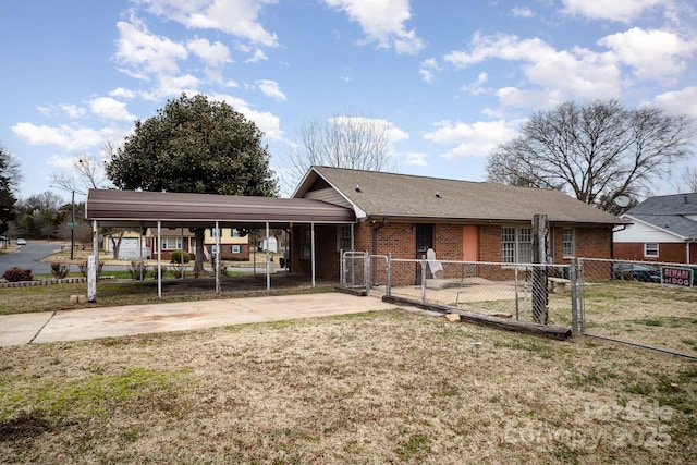 single story home featuring a gate, brick siding, a front yard, and fence