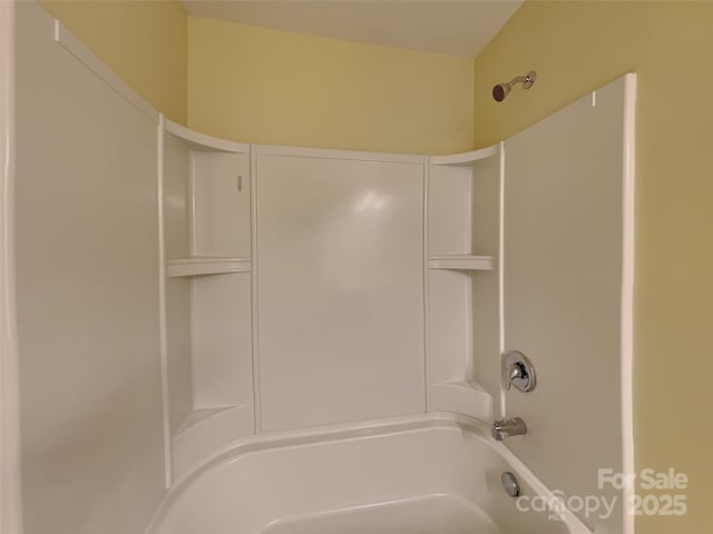 full bath featuring  shower combination