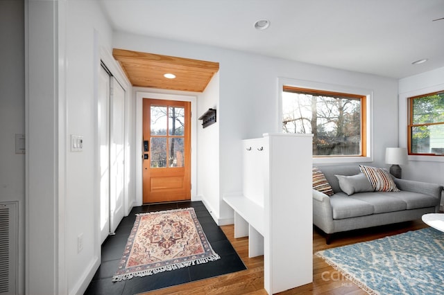 entryway with recessed lighting and wood finished floors