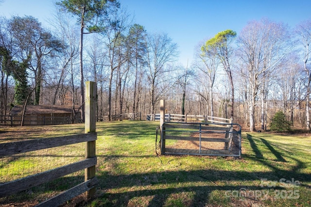 view of yard with a gate and fence