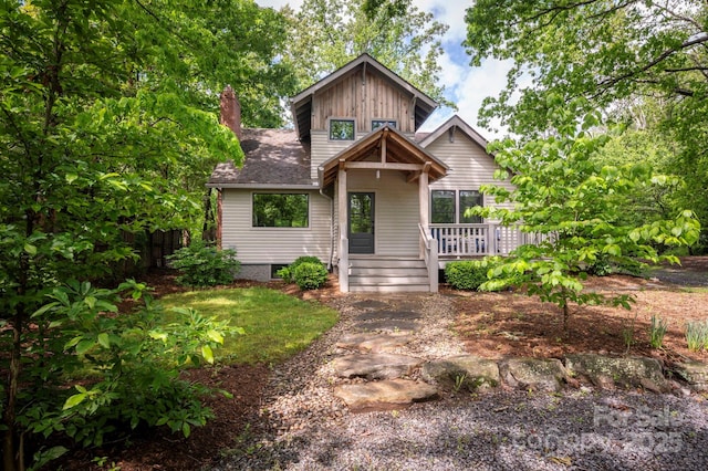 122AND124 Shelburne Rd, Asheville, NC 28806 - view of front of property with a deck, board and batten siding, and a chimney