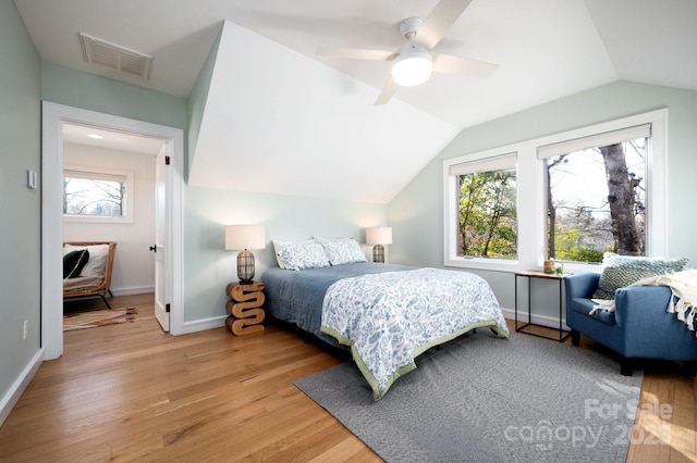 122AND124 Shelburne Rd, Asheville, NC 28806 - bedroom featuring light wood finished floors, vaulted ceiling, baseboards, and ceiling fan