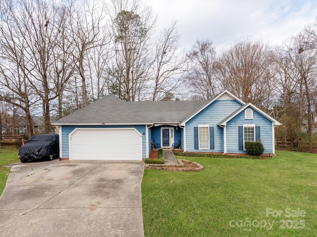 ranch-style house featuring a front yard, an attached garage, driveway, and a shingled roof