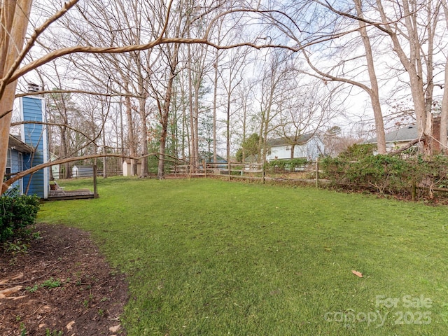 view of yard with fence