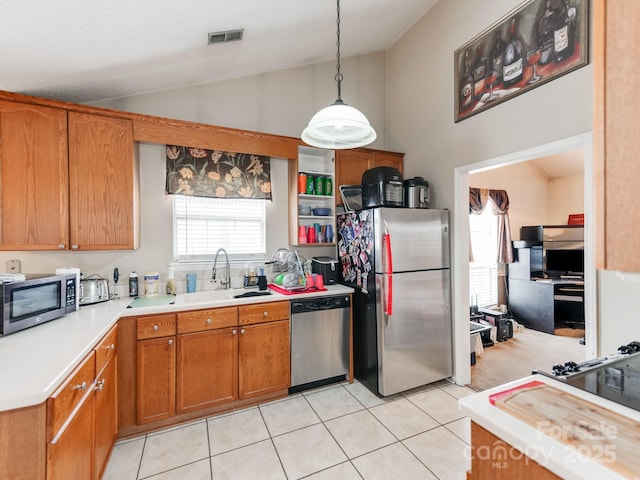 kitchen featuring visible vents, plenty of natural light, appliances with stainless steel finishes, and light countertops