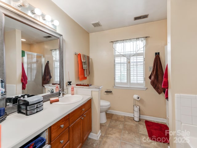 full bath with visible vents, toilet, an enclosed shower, and vanity