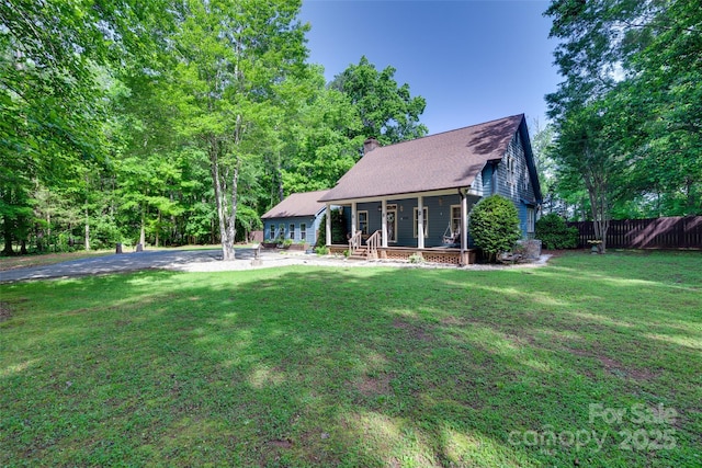 6688 Pine Forest Dr, York, SC 29745 - rear view of property with covered porch and a chimney