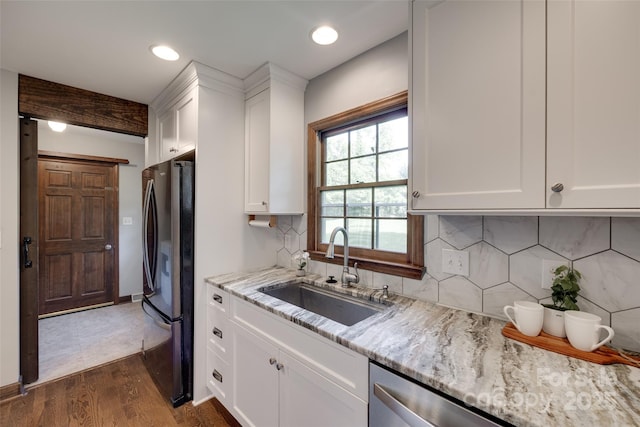6688 Pine Forest Dr, York, SC 29745 - kitchen featuring a sink, appliances with stainless steel finishes, white cabinets, dark wood-style floors, and recessed lighting