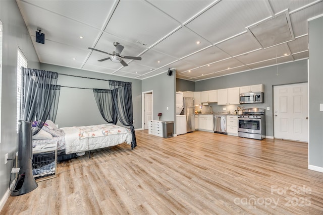 6688 Pine Forest Dr, York, SC 29745 - bedroom with freestanding refrigerator, light wood-style floors, recessed lighting, and baseboards