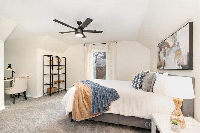 bedroom with lofted ceiling, baseboards, carpet floors, and ceiling fan