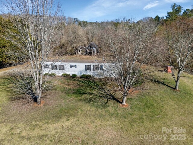 view of front of property with a front lawn