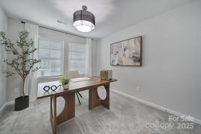 home office featuring visible vents, carpet floors, and baseboards