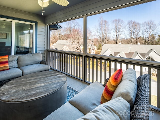 exterior space featuring a ceiling fan