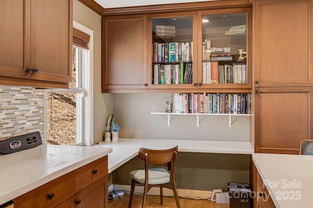 home office featuring built in study area