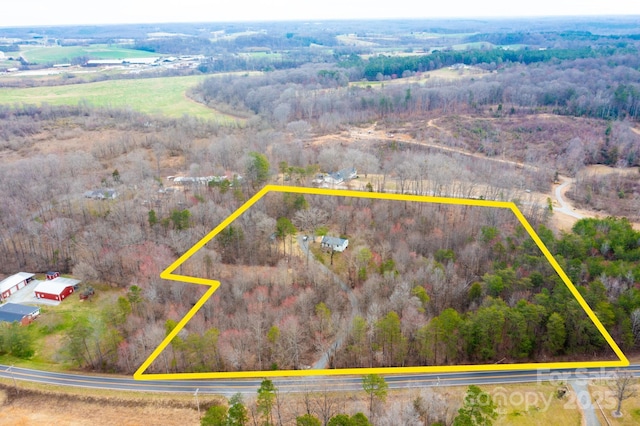 bird's eye view with a forest view