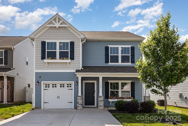 1120 Freeman View Dr, Albemarle, NC 28001 - craftsman-style home with a garage, central AC, driveway, a shingled roof, and covered porch