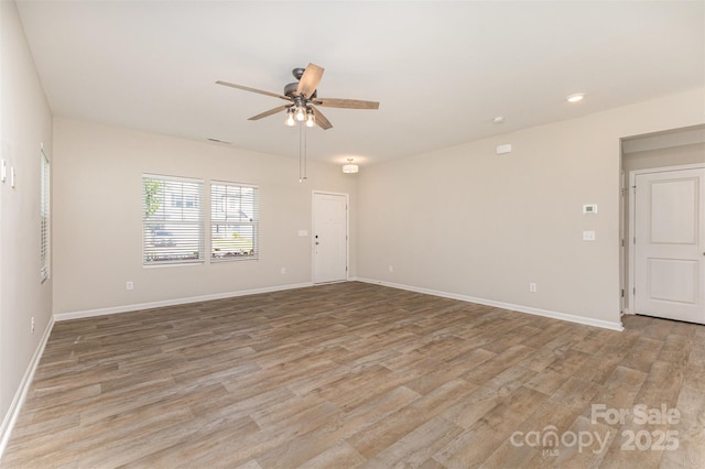 1120 Freeman View Dr, Albemarle, NC 28001 - unfurnished room featuring a ceiling fan, wood finished floors, and baseboards