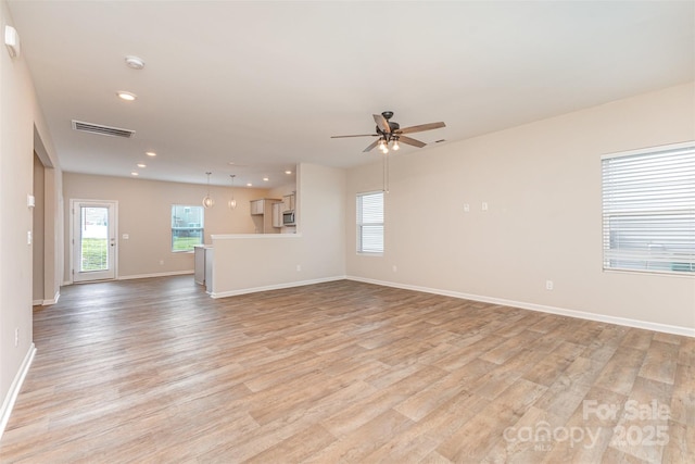 1120 Freeman View Dr, Albemarle, NC 28001 - unfurnished living room with recessed lighting, light wood-style flooring, a ceiling fan, and baseboards