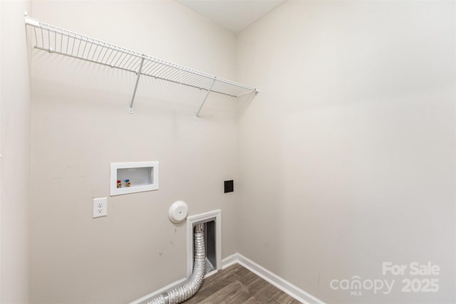 1120 Freeman View Dr, Albemarle, NC 28001 - laundry room featuring electric dryer hookup, dark wood finished floors, hookup for a gas dryer, washer hookup, and baseboards