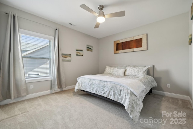 8310 Sandstone Crest Ln, Indian Land, SC 29707 - bedroom with visible vents, baseboards, carpet floors, and ceiling fan