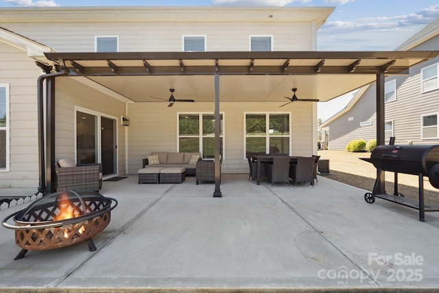 8310 Sandstone Crest Ln, Indian Land, SC 29707 - view of patio / terrace featuring outdoor dining area, a ceiling fan, and an outdoor living space with a fire pit