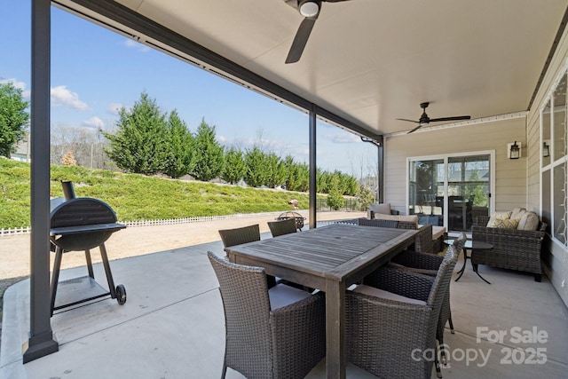 8310 Sandstone Crest Ln, Indian Land, SC 29707 - view of patio with area for grilling, ceiling fan, and outdoor dining space
