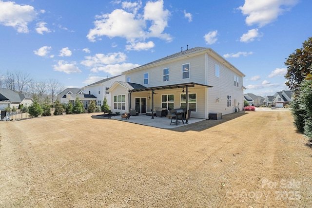 8310 Sandstone Crest Ln, Indian Land, SC 29707 - back of property with fence, ceiling fan, and a patio area