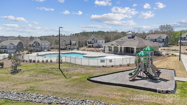 8310 Sandstone Crest Ln, Indian Land, SC 29707 - pool featuring a patio area, fence, playground community, and a residential view