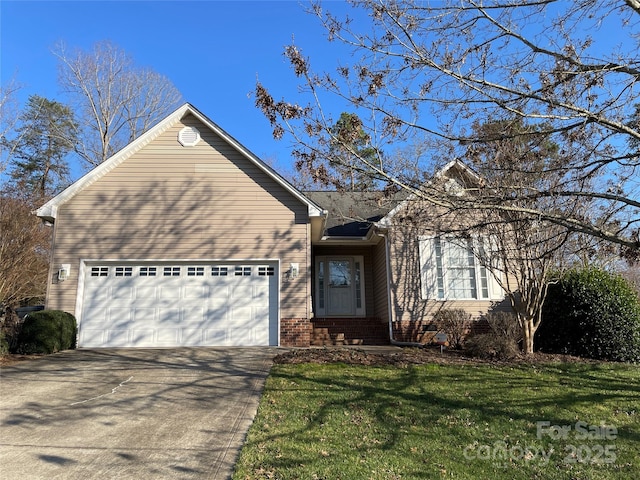 view of front of house with brick siding, an attached garage, driveway, and a front yard