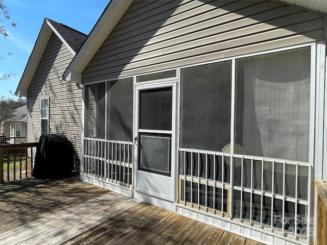 exterior space featuring a sunroom