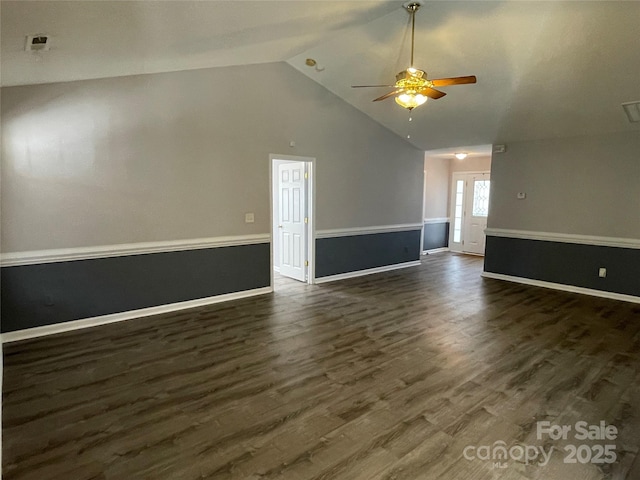 unfurnished room with dark wood finished floors, baseboards, high vaulted ceiling, and ceiling fan