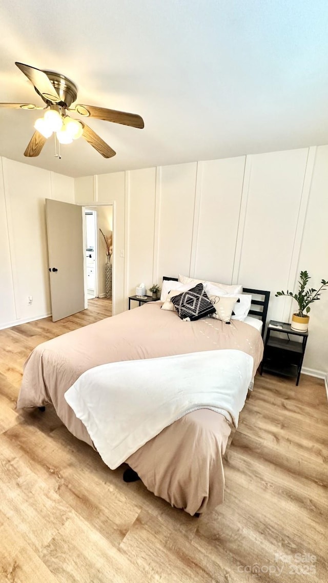 bedroom featuring ceiling fan and light wood-style floors