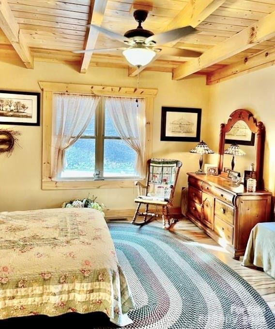 6033 Low Country Rd, Lenoir, NC 28645 - bedroom featuring beamed ceiling, wood finished floors, and wood ceiling