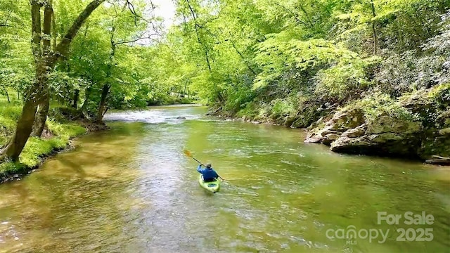 6033 Low Country Rd, Lenoir, NC 28645 - property view of water featuring a forest view
