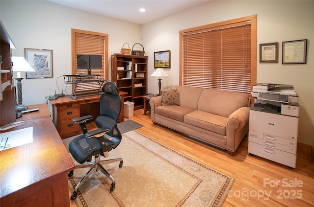 office area featuring light wood finished floors and recessed lighting