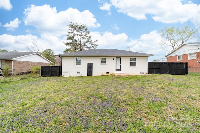2318 Knight Dr, Gastonia, NC 28052 - back of property featuring a fenced backyard and a lawn