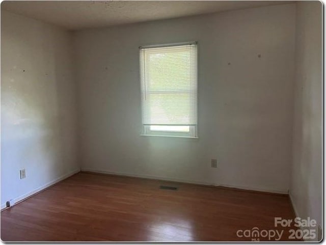1327 Crestview Dr, Shelby, NC 28150 - spare room featuring wood finished floors and baseboards