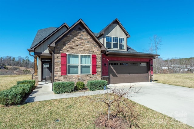 craftsman-style home with an attached garage, a front lawn, roof with shingles, stone siding, and driveway