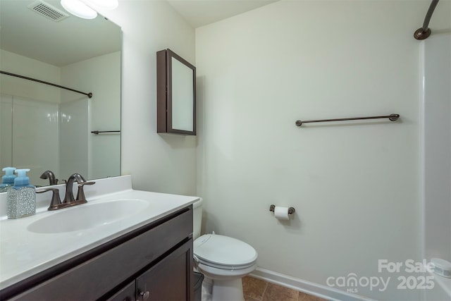 full bath featuring vanity, toilet, and visible vents