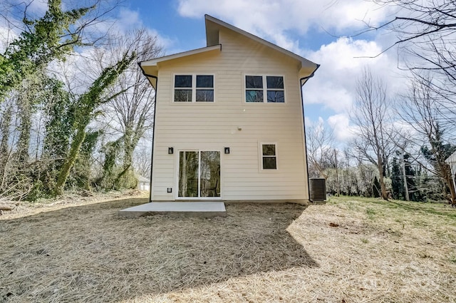 rear view of house with a patio