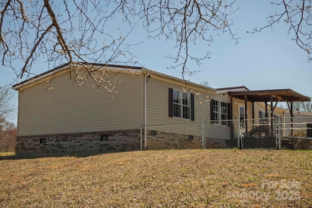 view of property exterior with crawl space, a lawn, and fence