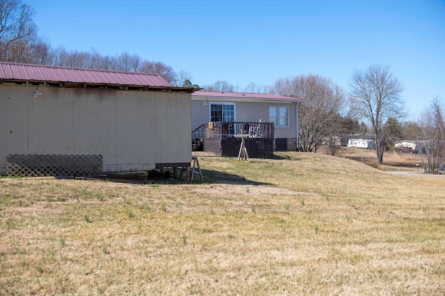 view of yard featuring a deck